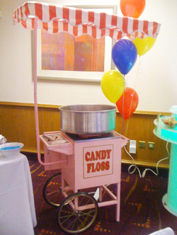 Candy Floss cart for hire with birthday balloons